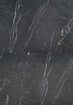 Beaulieu Klee 12x24 vinyl tile in a Black, Grey, & Ivory matte finish
